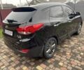 Чорний Хендай іх35, об'ємом двигуна 2 л та пробігом 210 тис. км за 12700 $, фото 3 на Automoto.ua