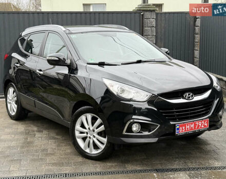 Чорний Хендай іх35, об'ємом двигуна 2 л та пробігом 206 тис. км за 13099 $, фото 3 на Automoto.ua