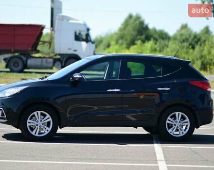 Чорний Хендай іх35, об'ємом двигуна 2 л та пробігом 226 тис. км за 10990 $, фото 8 на Automoto.ua