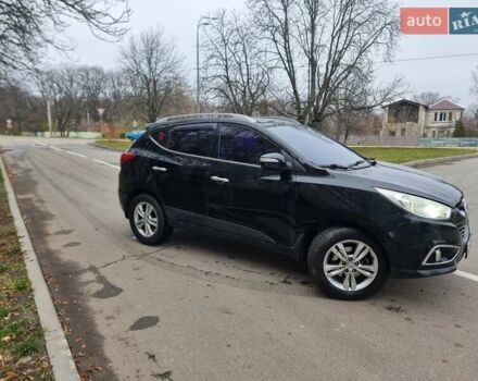 Чорний Хендай іх35, об'ємом двигуна 2 л та пробігом 188 тис. км за 11200 $, фото 6 на Automoto.ua