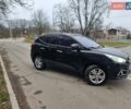 Чорний Хендай іх35, об'ємом двигуна 2 л та пробігом 188 тис. км за 11200 $, фото 6 на Automoto.ua