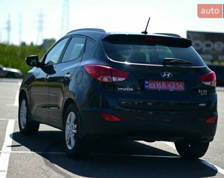 Чорний Хендай іх35, об'ємом двигуна 2 л та пробігом 226 тис. км за 10990 $, фото 2 на Automoto.ua