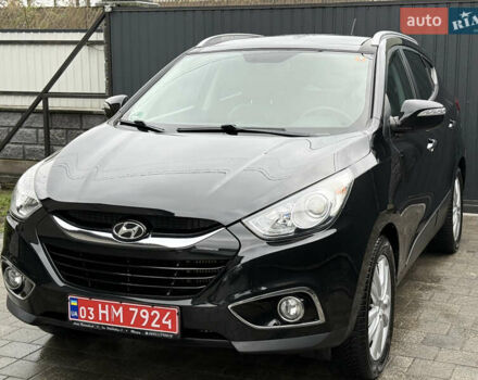 Чорний Хендай іх35, об'ємом двигуна 2 л та пробігом 206 тис. км за 13099 $, фото 22 на Automoto.ua