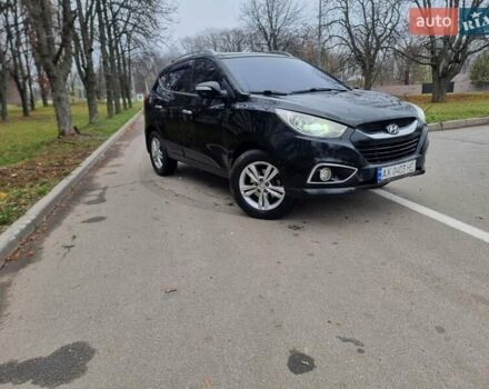 Чорний Хендай іх35, об'ємом двигуна 2 л та пробігом 188 тис. км за 11200 $, фото 9 на Automoto.ua