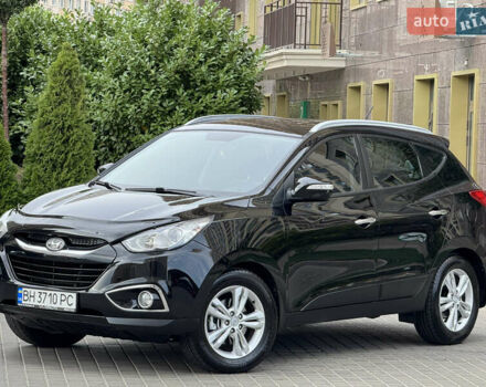 Черный Хендай их35, объемом двигателя 2 л и пробегом 155 тыс. км за 12500 $, фото 6 на Automoto.ua