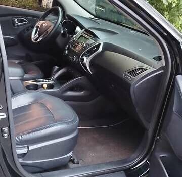 Черный Хендай их35, объемом двигателя 2 л и пробегом 161 тыс. км за 12600 $, фото 10 на Automoto.ua