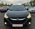 Черный Хендай их35, объемом двигателя 2 л и пробегом 157 тыс. км за 12700 $, фото 1 на Automoto.ua