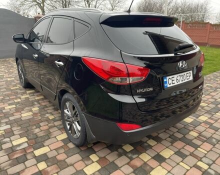 Чорний Хендай іх35, об'ємом двигуна 2 л та пробігом 210 тис. км за 12700 $, фото 4 на Automoto.ua
