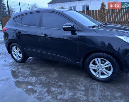 Чорний Хендай іх35, об'ємом двигуна 2 л та пробігом 252 тис. км за 11000 $, фото 5 на Automoto.ua