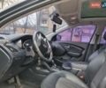 Чорний Хендай іх35, об'ємом двигуна 2 л та пробігом 188 тис. км за 11200 $, фото 4 на Automoto.ua