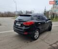 Чорний Хендай іх35, об'ємом двигуна 2 л та пробігом 188 тис. км за 11200 $, фото 1 на Automoto.ua