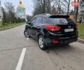 Чорний Хендай іх35, об'ємом двигуна 2 л та пробігом 188 тис. км за 11200 $, фото 1 на Automoto.ua