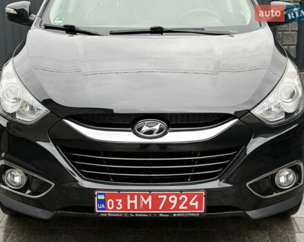 Чорний Хендай іх35, об'ємом двигуна 2 л та пробігом 206 тис. км за 13099 $, фото 18 на Automoto.ua