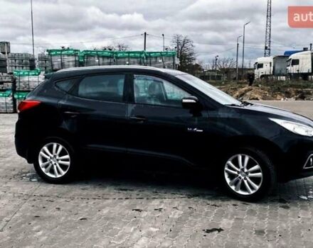 Черный Хендай их35, объемом двигателя 1.69 л и пробегом 290 тыс. км за 10999 $, фото 3 на Automoto.ua