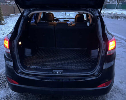 Чорний Хендай іх35, об'ємом двигуна 2 л та пробігом 252 тис. км за 11000 $, фото 10 на Automoto.ua