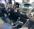 Чорний Хендай іх35, об'ємом двигуна 2 л та пробігом 218 тис. км за 12990 $, фото 26 на Automoto.ua