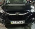 Чорний Хендай іх35, об'ємом двигуна 2 л та пробігом 157 тис. км за 12000 $, фото 1 на Automoto.ua