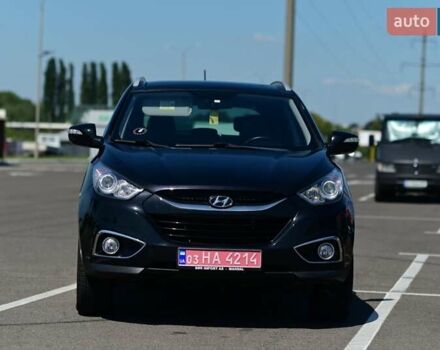 Чорний Хендай іх35, об'ємом двигуна 2 л та пробігом 226 тис. км за 10990 $, фото 4 на Automoto.ua