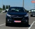 Чорний Хендай іх35, об'ємом двигуна 2 л та пробігом 226 тис. км за 10990 $, фото 4 на Automoto.ua