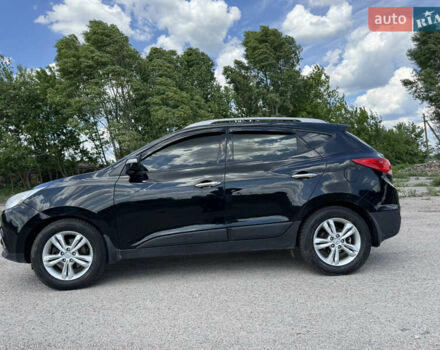 Черный Хендай их35, объемом двигателя 2 л и пробегом 121 тыс. км за 14000 $, фото 6 на Automoto.ua