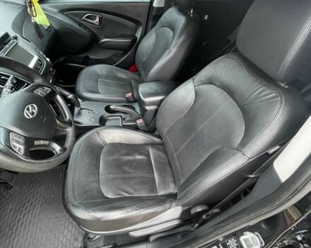 Чорний Хендай іх35, об'ємом двигуна 2 л та пробігом 210 тис. км за 12700 $, фото 5 на Automoto.ua