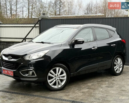 Чорний Хендай іх35, об'ємом двигуна 2 л та пробігом 206 тис. км за 13099 $, фото 27 на Automoto.ua