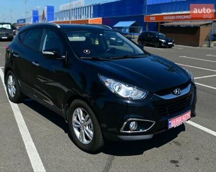 Чорний Хендай іх35, об'ємом двигуна 2 л та пробігом 226 тис. км за 10990 $, фото 7 на Automoto.ua