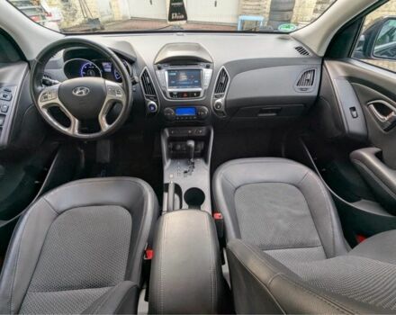 Черный Хендай их35, объемом двигателя 2 л и пробегом 200 тыс. км за 12650 $, фото 5 на Automoto.ua