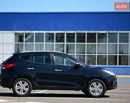 Чорний Хендай іх35, об'ємом двигуна 2 л та пробігом 226 тис. км за 10990 $, фото 3 на Automoto.ua