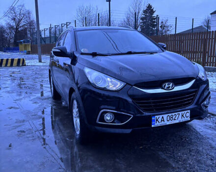 Чорний Хендай іх35, об'ємом двигуна 2 л та пробігом 252 тис. км за 11000 $, фото 4 на Automoto.ua
