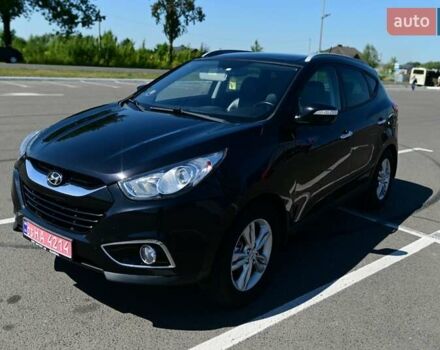 Чорний Хендай іх35, об'ємом двигуна 2 л та пробігом 226 тис. км за 10990 $, фото 9 на Automoto.ua