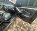 Чорний Хендай іх35, об'ємом двигуна 2 л та пробігом 210 тис. км за 12700 $, фото 7 на Automoto.ua
