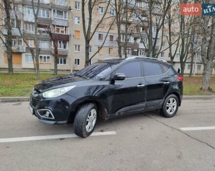 Чорний Хендай іх35, об'ємом двигуна 2 л та пробігом 188 тис. км за 11200 $, фото 7 на Automoto.ua