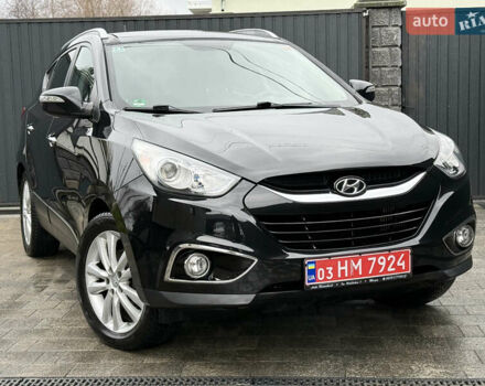 Чорний Хендай іх35, об'ємом двигуна 2 л та пробігом 206 тис. км за 13099 $, фото 6 на Automoto.ua