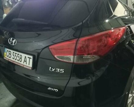 Чорний Хендай іх35, об'ємом двигуна 2 л та пробігом 157 тис. км за 12000 $, фото 19 на Automoto.ua