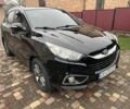 Чорний Хендай іх35, об'ємом двигуна 2 л та пробігом 210 тис. км за 12700 $, фото 1 на Automoto.ua
