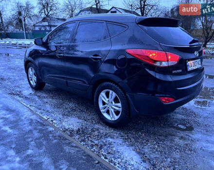 Чорний Хендай іх35, об'ємом двигуна 2 л та пробігом 252 тис. км за 11000 $, фото 2 на Automoto.ua
