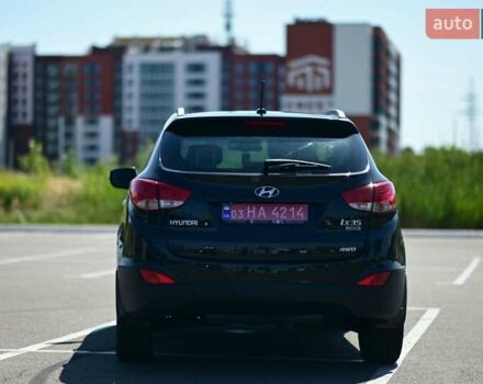 Чорний Хендай іх35, об'ємом двигуна 2 л та пробігом 226 тис. км за 10990 $, фото 1 на Automoto.ua