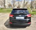 Чорний Хендай іх35, об'ємом двигуна 2 л та пробігом 180 тис. км за 12999 $, фото 5 на Automoto.ua