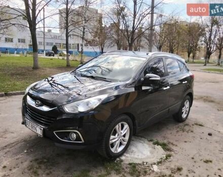 Чорний Хендай іх35, об'ємом двигуна 2 л та пробігом 180 тис. км за 12999 $, фото 21 на Automoto.ua