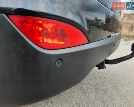 Чорний Хендай іх35, об'ємом двигуна 2 л та пробігом 211 тис. км за 12700 $, фото 88 на Automoto.ua