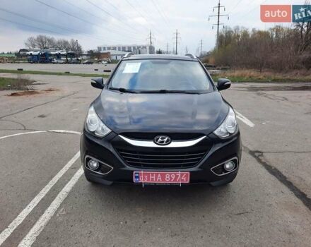 Чорний Хендай іх35, об'ємом двигуна 2 л та пробігом 211 тис. км за 12700 $, фото 5 на Automoto.ua