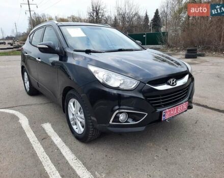 Чорний Хендай іх35, об'ємом двигуна 2 л та пробігом 211 тис. км за 12700 $, фото 21 на Automoto.ua