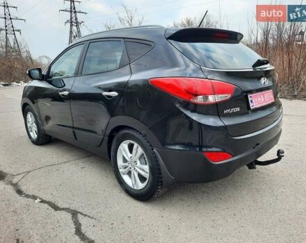 Чорний Хендай іх35, об'ємом двигуна 2 л та пробігом 211 тис. км за 12700 $, фото 12 на Automoto.ua