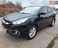 Чорний Хендай іх35, об'ємом двигуна 2 л та пробігом 211 тис. км за 12700 $, фото 1 на Automoto.ua