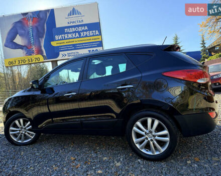 Чорний Хендай іх35, об'ємом двигуна 2 л та пробігом 153 тис. км за 13999 $, фото 22 на Automoto.ua