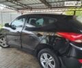 Чорний Хендай іх35, об'ємом двигуна 2 л та пробігом 148 тис. км за 12800 $, фото 1 на Automoto.ua