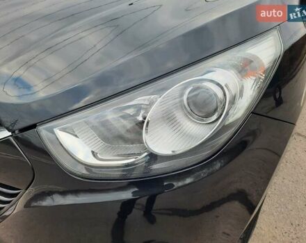 Чорний Хендай іх35, об'ємом двигуна 2 л та пробігом 211 тис. км за 12700 $, фото 24 на Automoto.ua