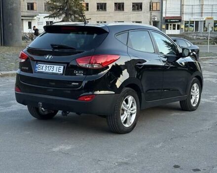 Чорний Хендай іх35, об'ємом двигуна 2 л та пробігом 173 тис. км за 13800 $, фото 16 на Automoto.ua