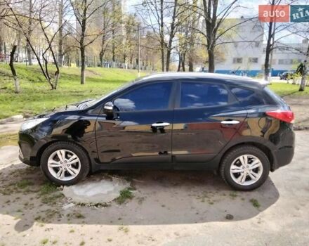 Чорний Хендай іх35, об'ємом двигуна 2 л та пробігом 180 тис. км за 12999 $, фото 6 на Automoto.ua